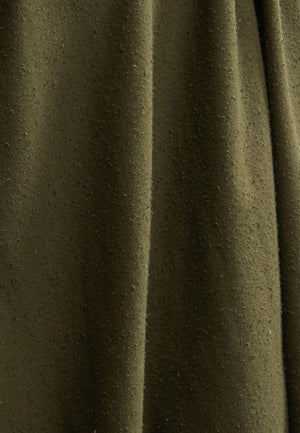 woman wearing a size medium tan raw silk noil oversized cardigan
