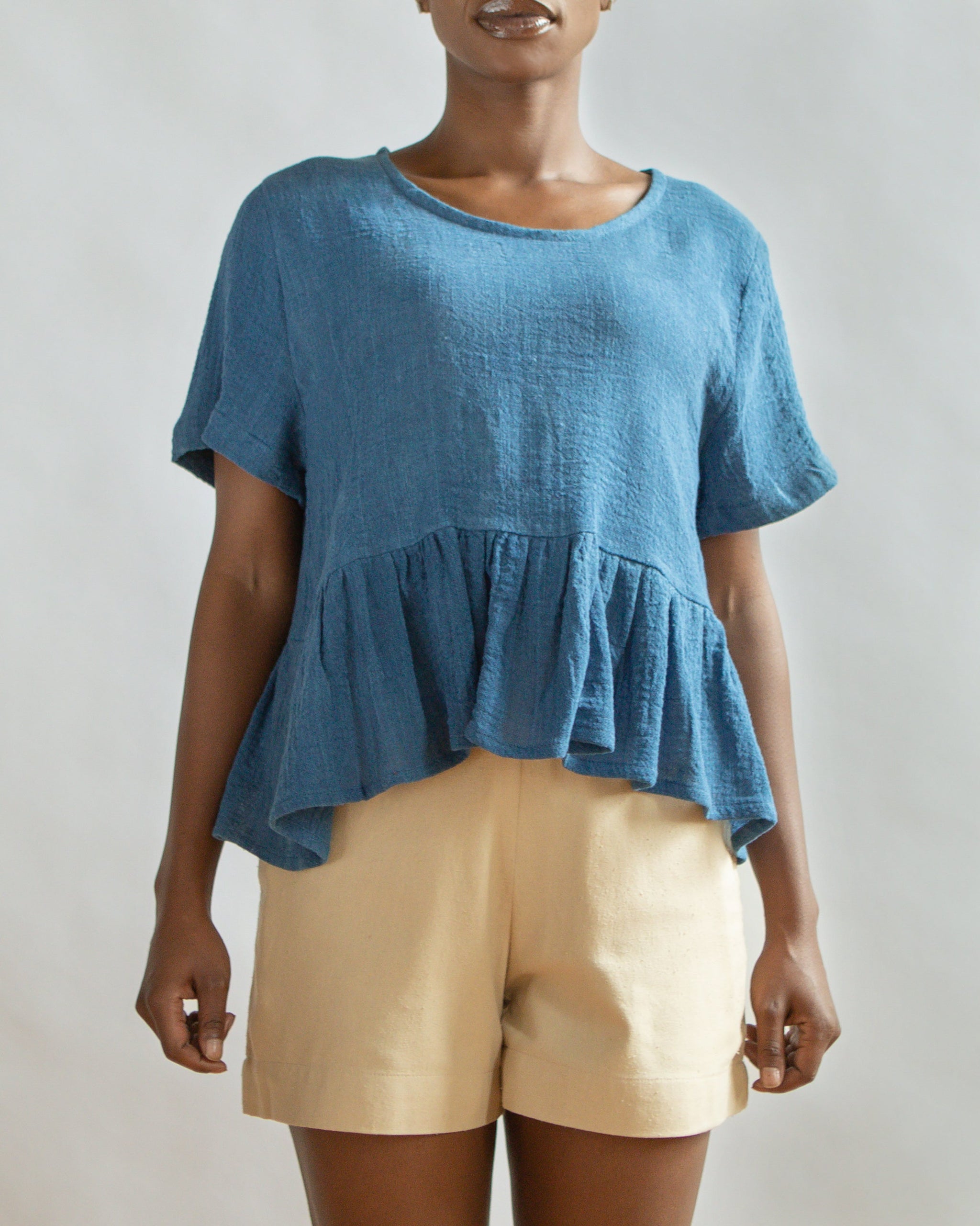 THE INDIGO OMBRE PEPLUM TOP