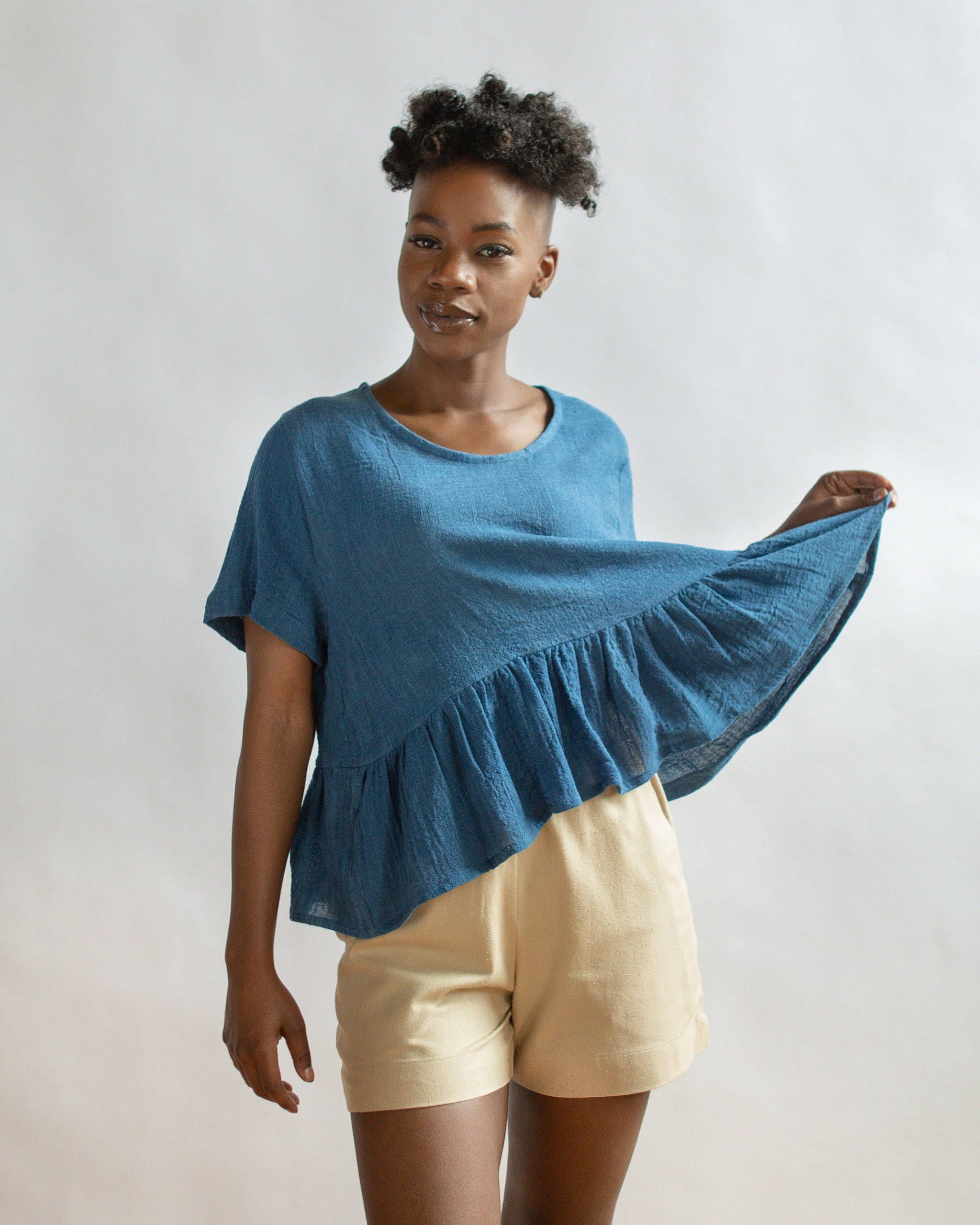 THE INDIGO OMBRE PEPLUM TOP