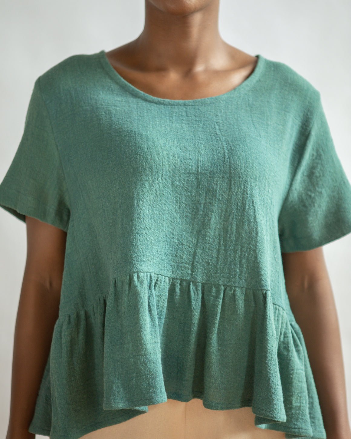THE NATURALLY DYED PEPLUM TOP IN COTTON GAUZE