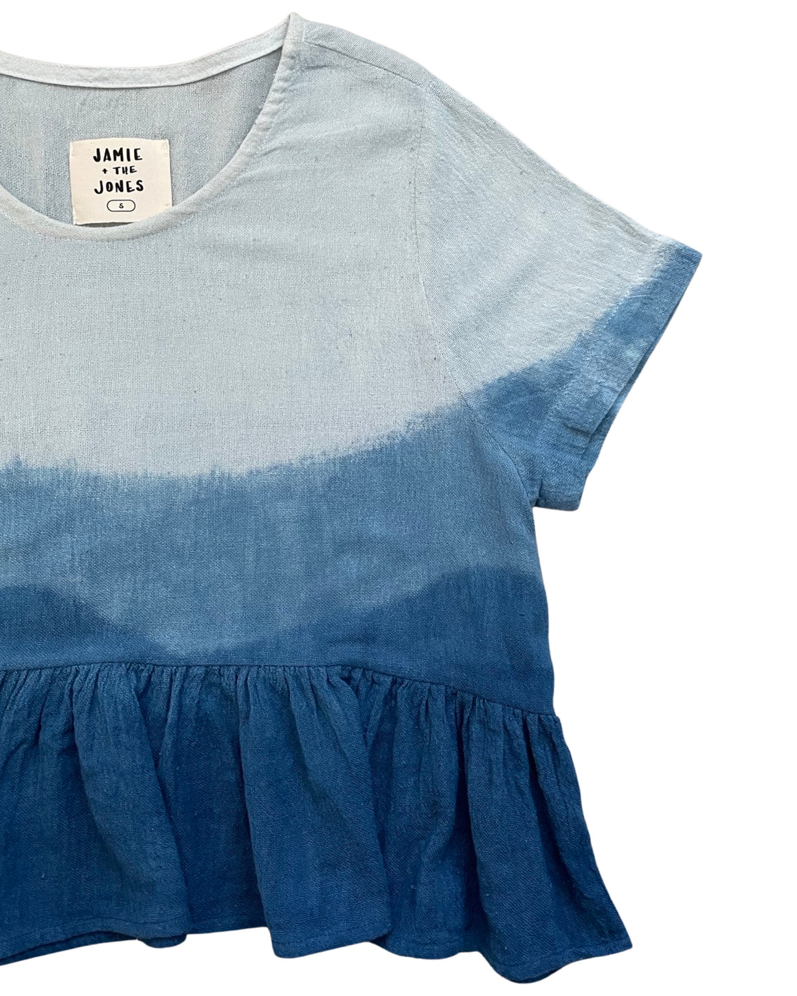 THE INDIGO OMBRE PEPLUM TOP